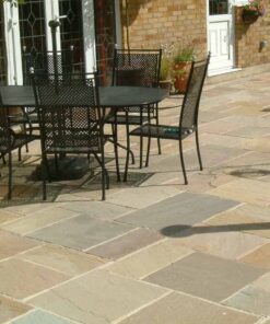 Raj green sandstone in outside patio area with table and chairs